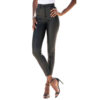 Women wearing black high waisted cowskin leather skinny pants with button fly closure