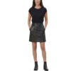 Front view of a woman wearing a high-waisted black genuine cowhide leather mini skirt with side pockets and black boots, as show.