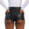 Close-up back view of a model wearing high-waisted women's black leather shorts with back pockets.