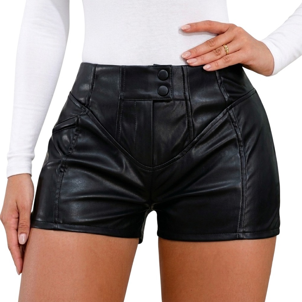 Essential high-waisted real leather shorts in a studio setting.