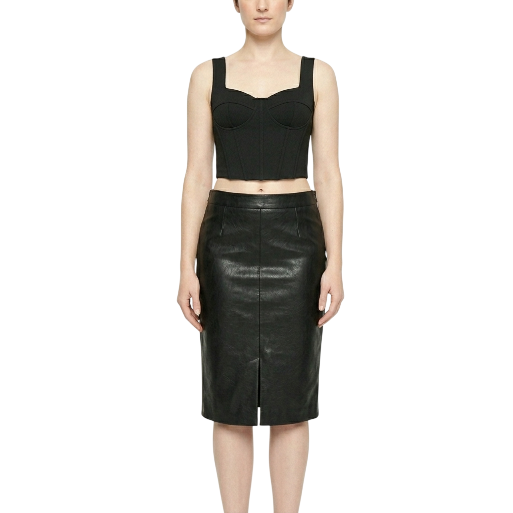 Front view of a woman wearing a high-waisted black genuine leather midi skirt with a front center slit on a pure white background.