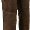 Real leather motorcycle chaps, distressed brown color, with zipper and snaps, worn over jeans.