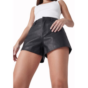 A low-angle studio shot captures a woman from the waist down, wearing a crisp white ribbed tank top and high-waisted, A-line black real leather shorts.